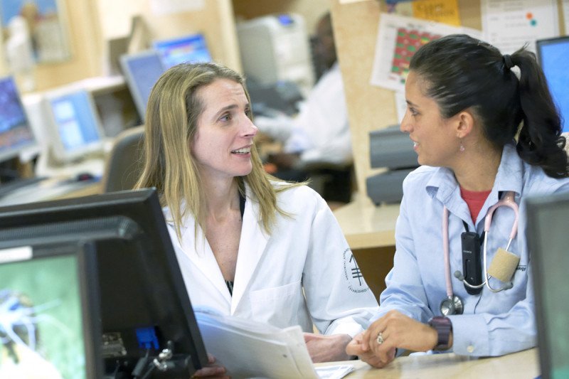 Carol Aghajanian, Chief of Gynecologic Medical Oncology, discusses lab results with a nurse