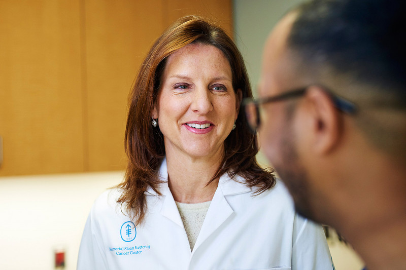 MSK Radiation Oncologist, Kathryn Beal, smiles at patient.